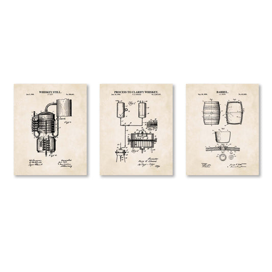 Three framed prints with vintage-style whiskey production diagrams on a beige background