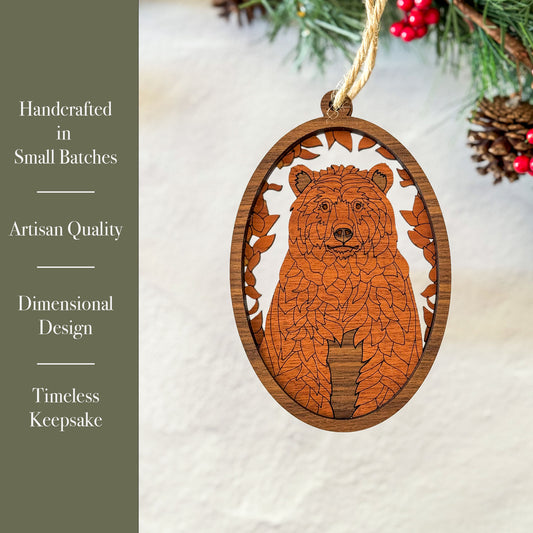 Wooden bear ornament with leaf pattern on a white background with Christmas decorations.