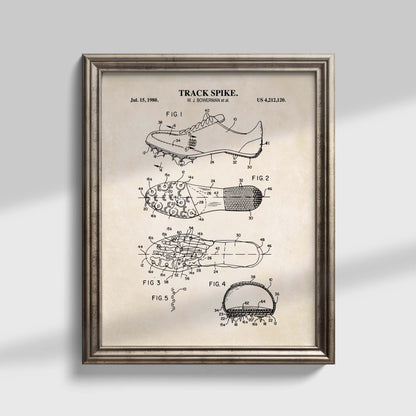 Framed patent poster of a track spike on a gray background