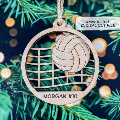 Volleyball ornament SVG listing image showing a laser-cut wooden sample with a layered ball, net, and personalized player name and number.