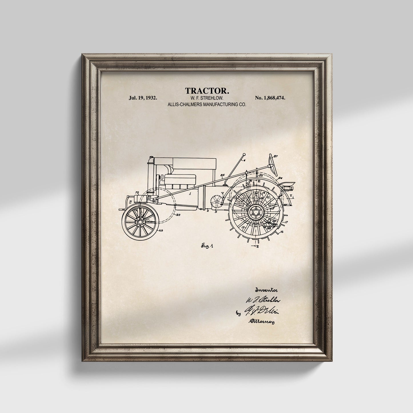 Framed vintage tractor patent print on a light gray background