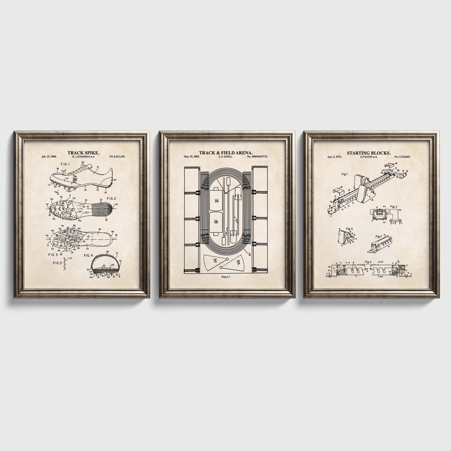 Three framed track and field patent prints on a white wall