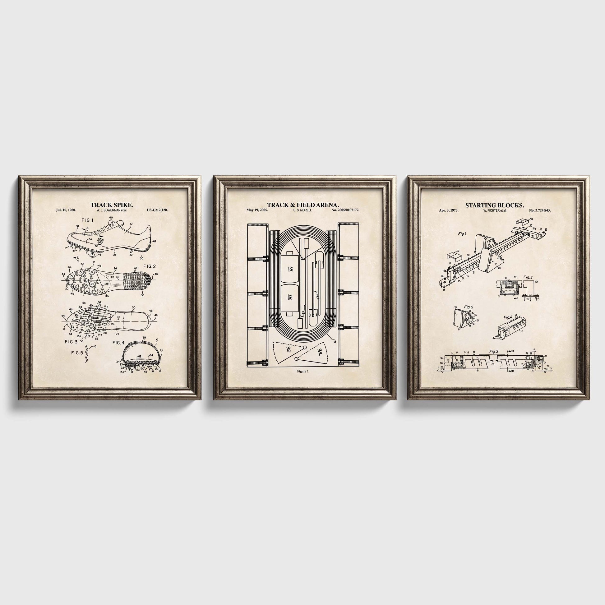 Three framed track and field patent prints on a white wall