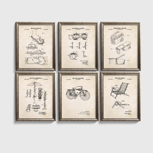 Set of six framed vintage-style beach product patent prints on a white wall.