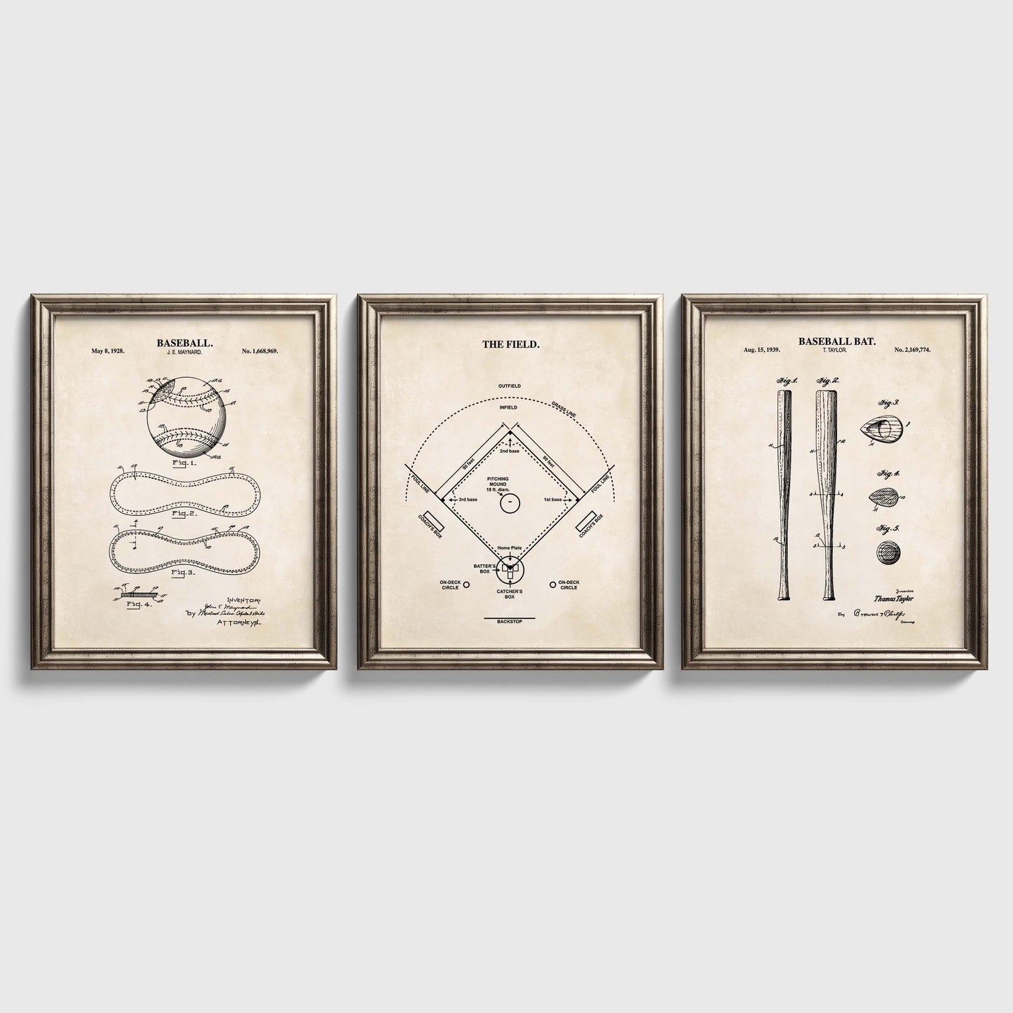 Three framed baseball-themed prints on a light gray background