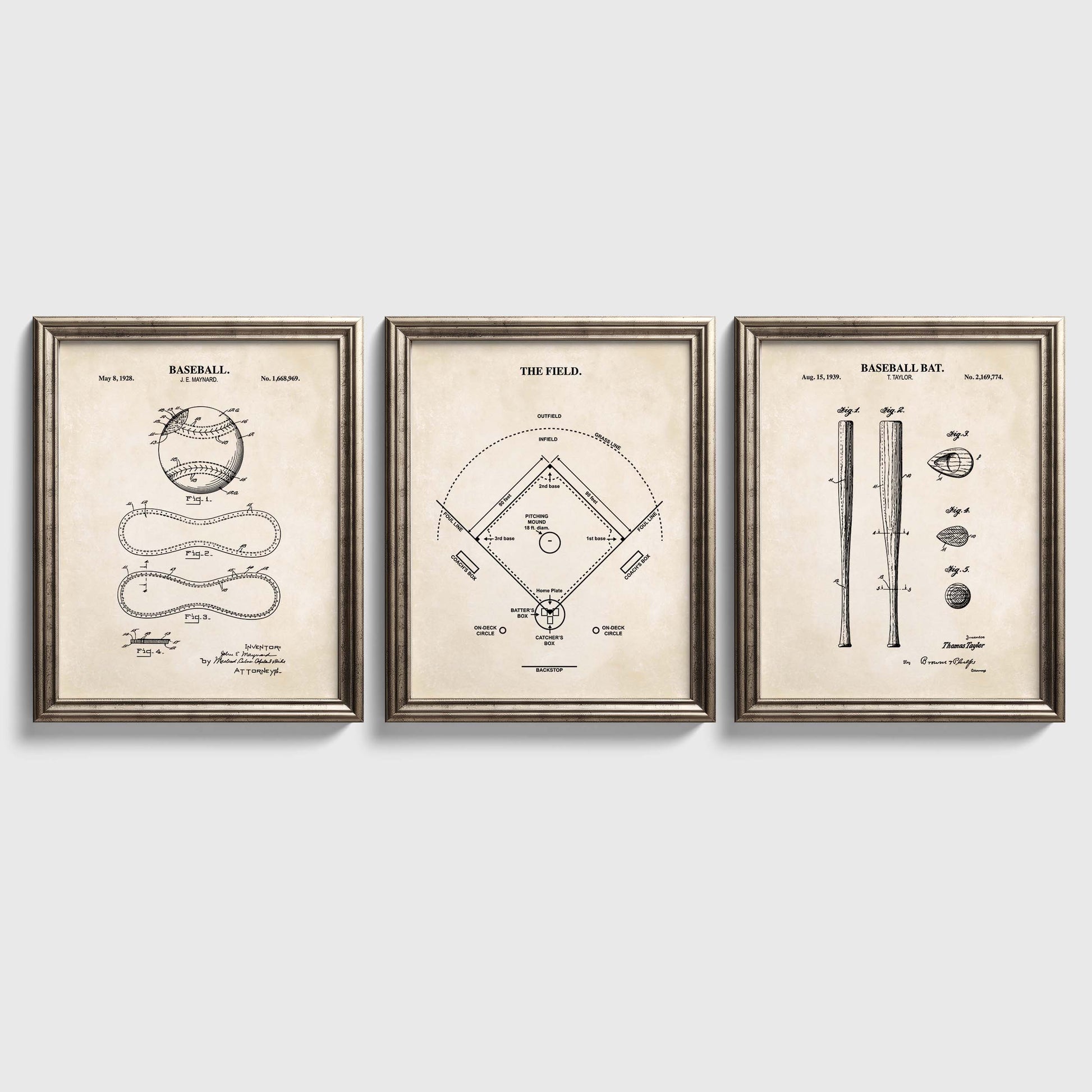 Three framed baseball-themed prints on a light gray background