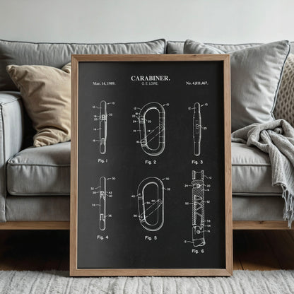 Framed patent poster of a carabiner on a gray sofa.