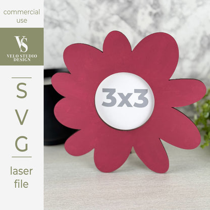 A pink flower-shaped laser-cut design displayed on a marble surface, with a white circular center containing the text '3x3'. The left side features a vertical banner with the text 'commercial use', 'VELO STUDIO DESIGN', 'SVG', and 'laser file'.
