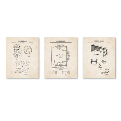 Three vintage-style soccer patent art prints displayed side by side on a white background. The prints feature black technical drawings and text on an aged beige paper texture, depicting a soccer ball, soccer field, and soccer goal.