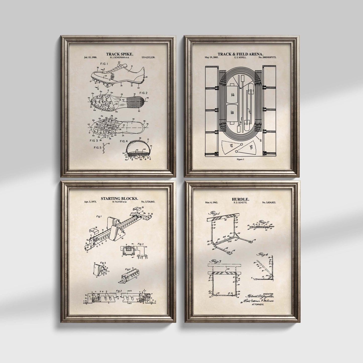 Four framed track and field prints with architectural drawings on a light gray background