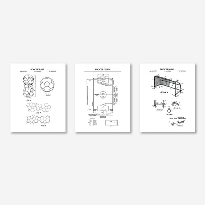 Three white wall art prints with black technical-style soccer illustrations and diagrams, shown side by side on a light gray background.
