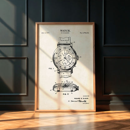 Framed watch patent poster on a wooden floor with a dark paneled wall background