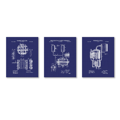 Three blueprints of whiskey making equipment on a white background
