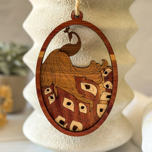Handcrafted peacock wood wall charm with layered natural wood feathers