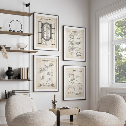 Modern living room with framed track and field patent drawings on the wall, two armchairs, and a window.