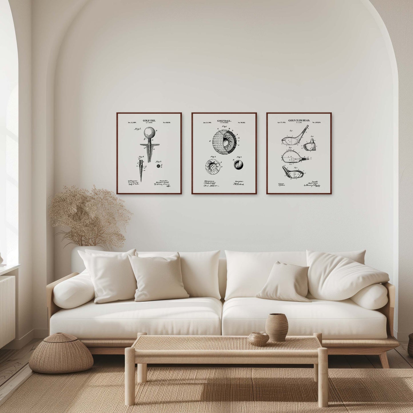 Modern living room with a white sofa, coffee table, and framed artwork on the wall.