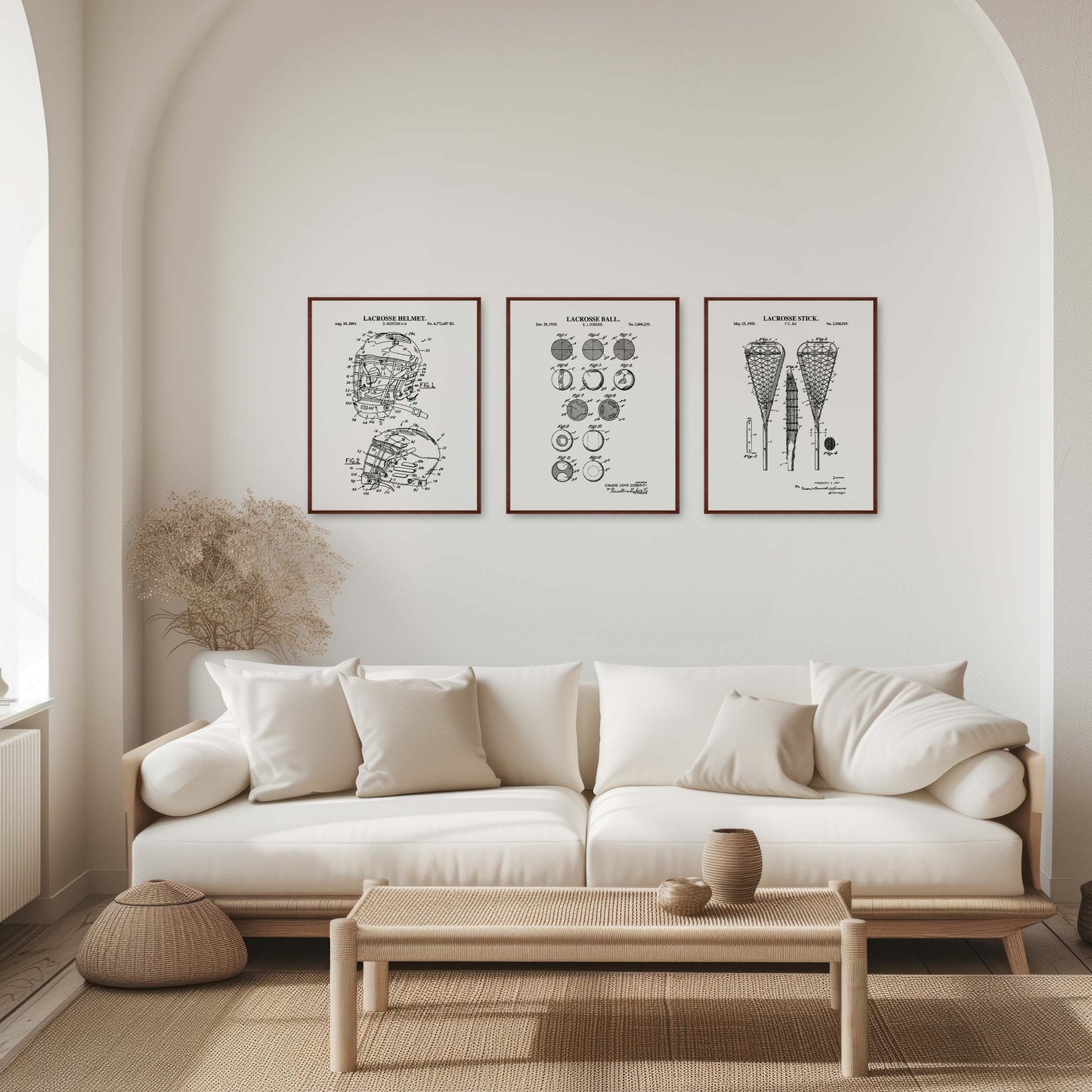 Modern living room with a white sofa, coffee table, and framed lacrosse artwork on the wall.