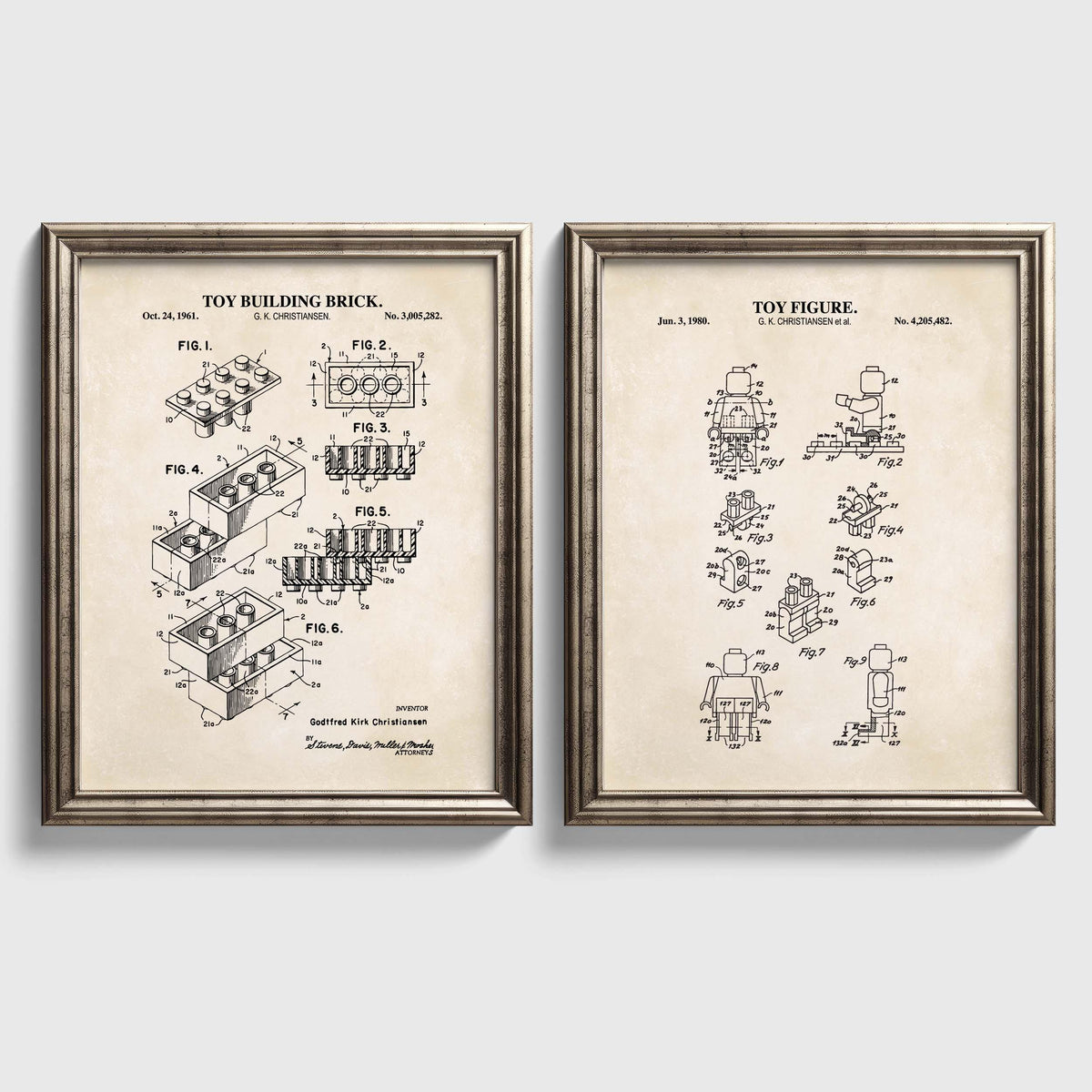 Set of two vintage toy brick patent prints featuring a building brick and coordinating toy figure in silver frames.